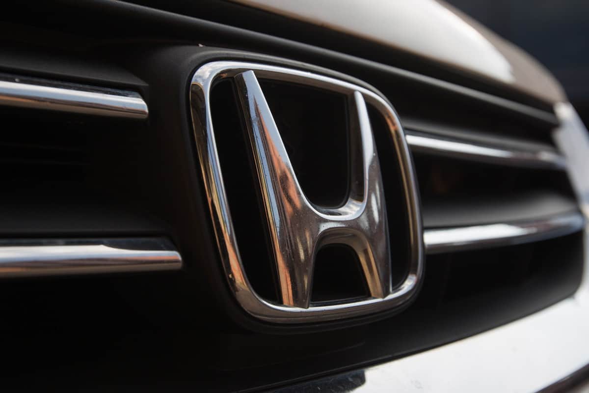  Honda car logo on a white Honda car.