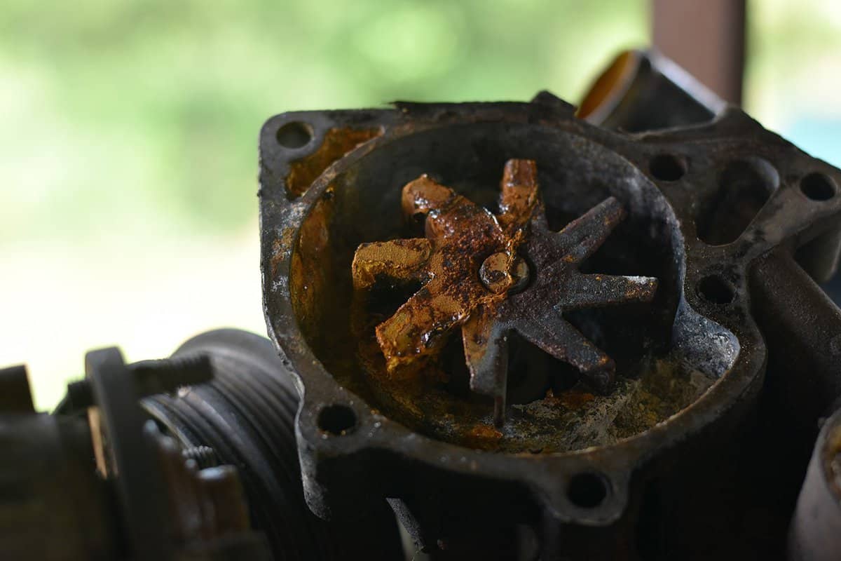 Worn out water pump dismounted from the vehicle engine cooling system
