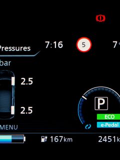 Closeup activated TPMS (Tire Pressure Monitoring System) monitoring display on vehicle cluster, Check tire pressure, Will A Tire Pressure Sensor Fail Inspection
