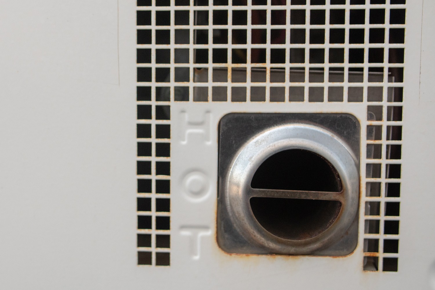 Hot letters on a RV Water Heater Vent