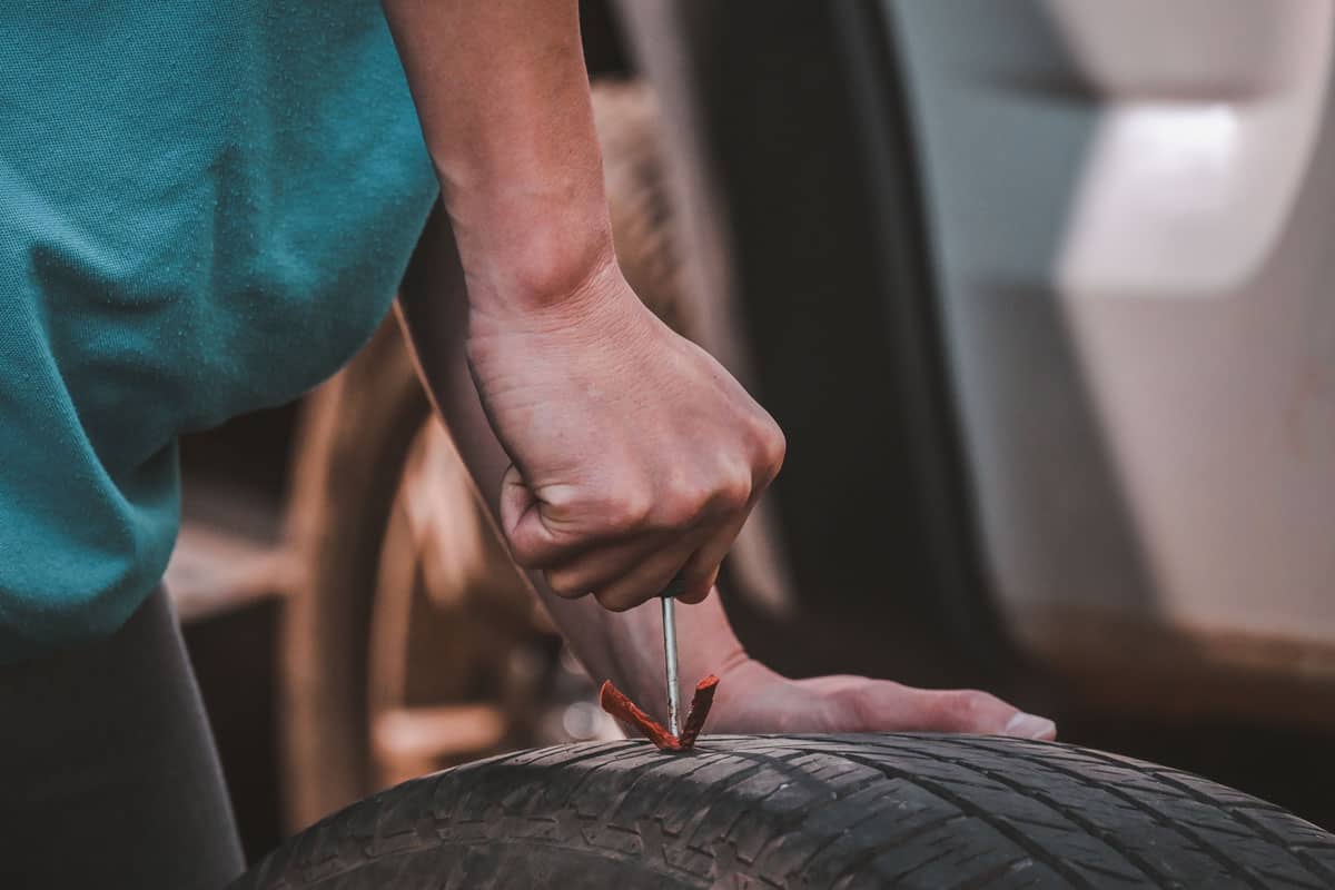 Inserting a patch to a hole of a car tire