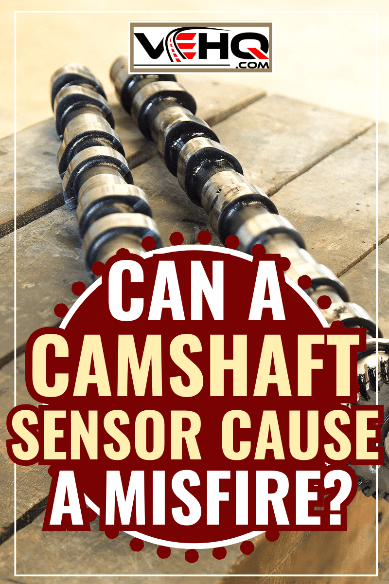 Sport engine camshafts isolated on wood panels. - Can Camshaft Sensor Cause Misfire?