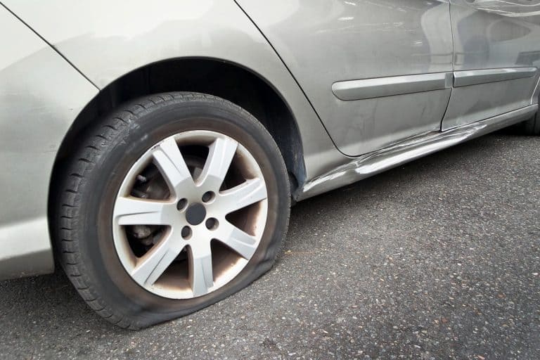 Up close photo of a car flat tire, Can You Get A Flat Tire From Hitting A Curb?