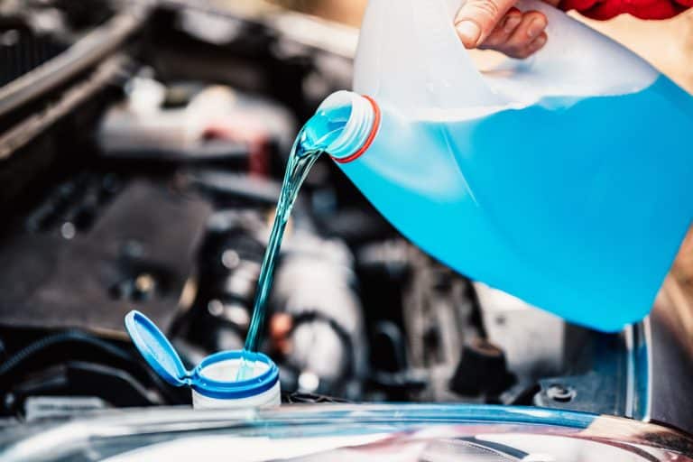 Pouring anti freeze to a car coolant reservoir, Antifreeze vs. Professional Tire Balancing: Can You Use Antifreeze To Balance Tires?