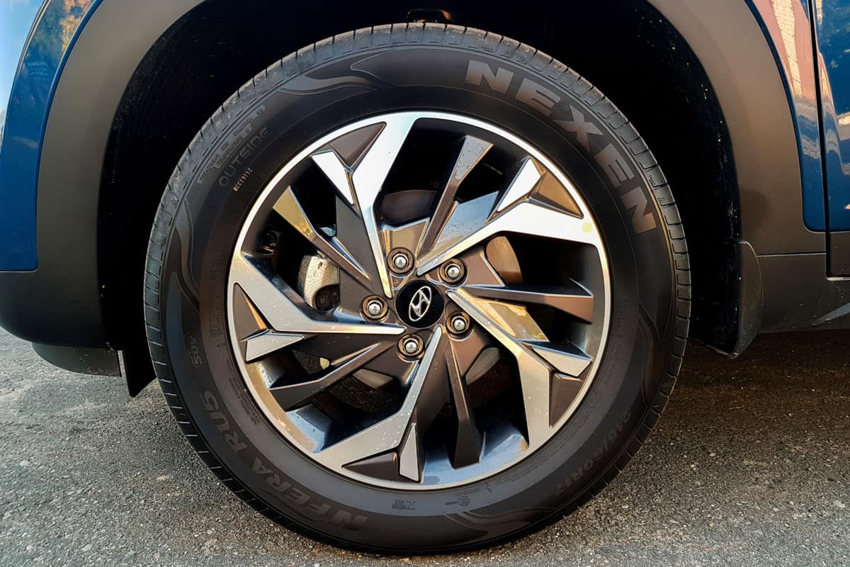 An up close photo of a Nexen tire used by an SUV