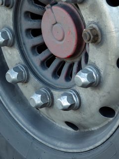 Dusty truck wheel rim, Balancing Act: Centramatics Tire Balancing Explained
