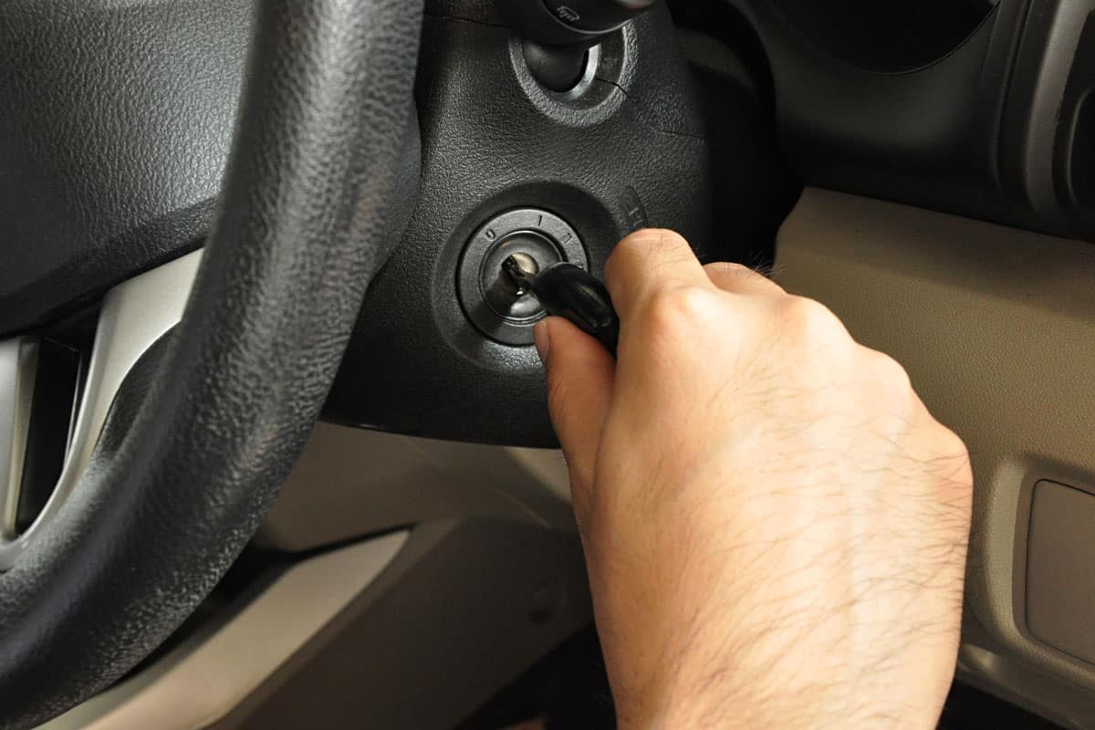 Inserting the key to the car ignition