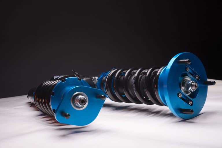 Blue-and-black-colored-car-coilovers, Coilover Confusion: What Causes Coilovers To Squeak?