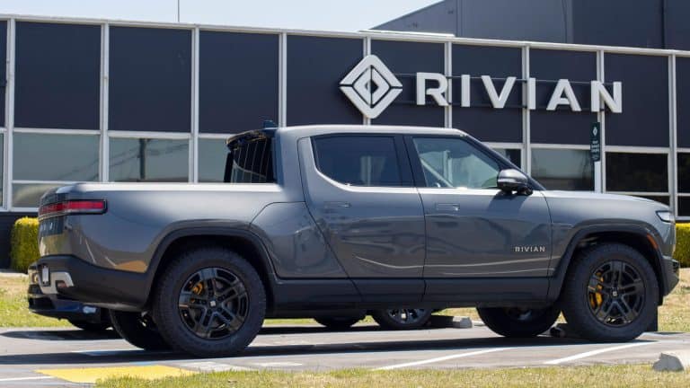 A new Quad Rivian R1T truck is seen at a Rivian service center - Rivian Quad Motor vs. Dual Motor [What Are The Differences?]