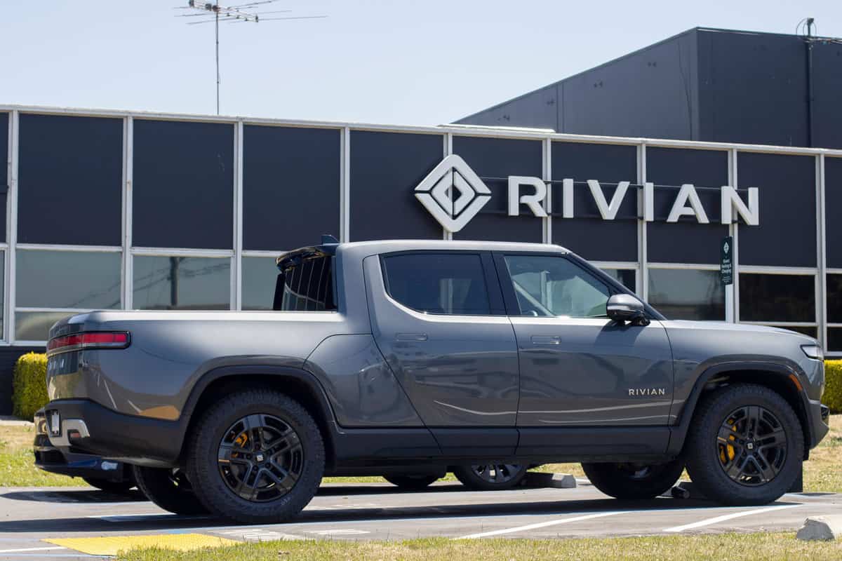 A new Quad Rivian R1T truck is seen at a Rivian service center. 
