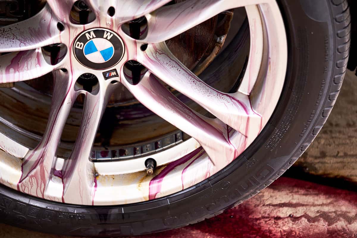 A BMW car rim showing the car's brake rotors