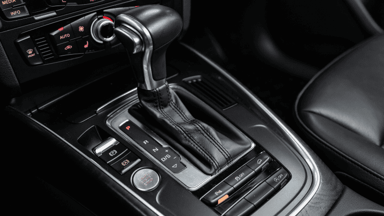 An Audi vehicle set to parking, Audi's Parking Brake Won't Release: Causes & Solutions - 1600x900