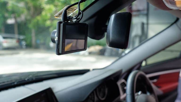 A car dashboard camera, My Dash Cam Is Overheating! Here's Why and What You Can Do - 1600x900