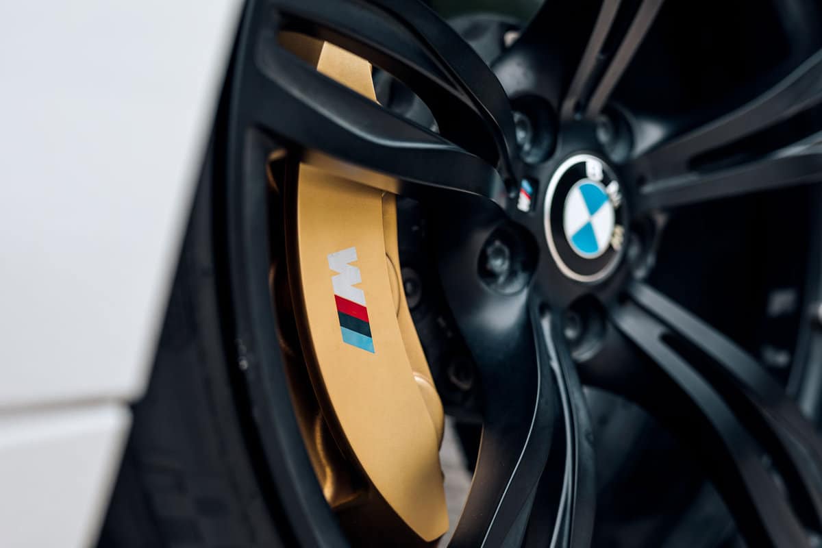Up close photo of a BMW car brand new brake rotors
