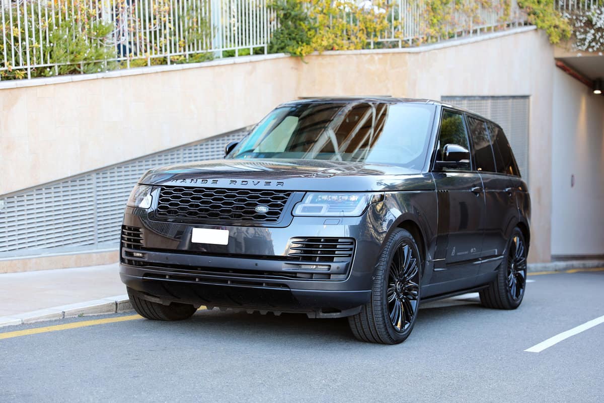High end Range Rover coming out of the driveway