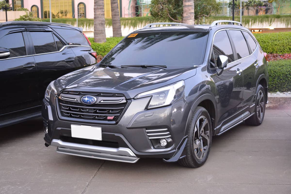 A 2023 Subaru Forester parked outside a dealership