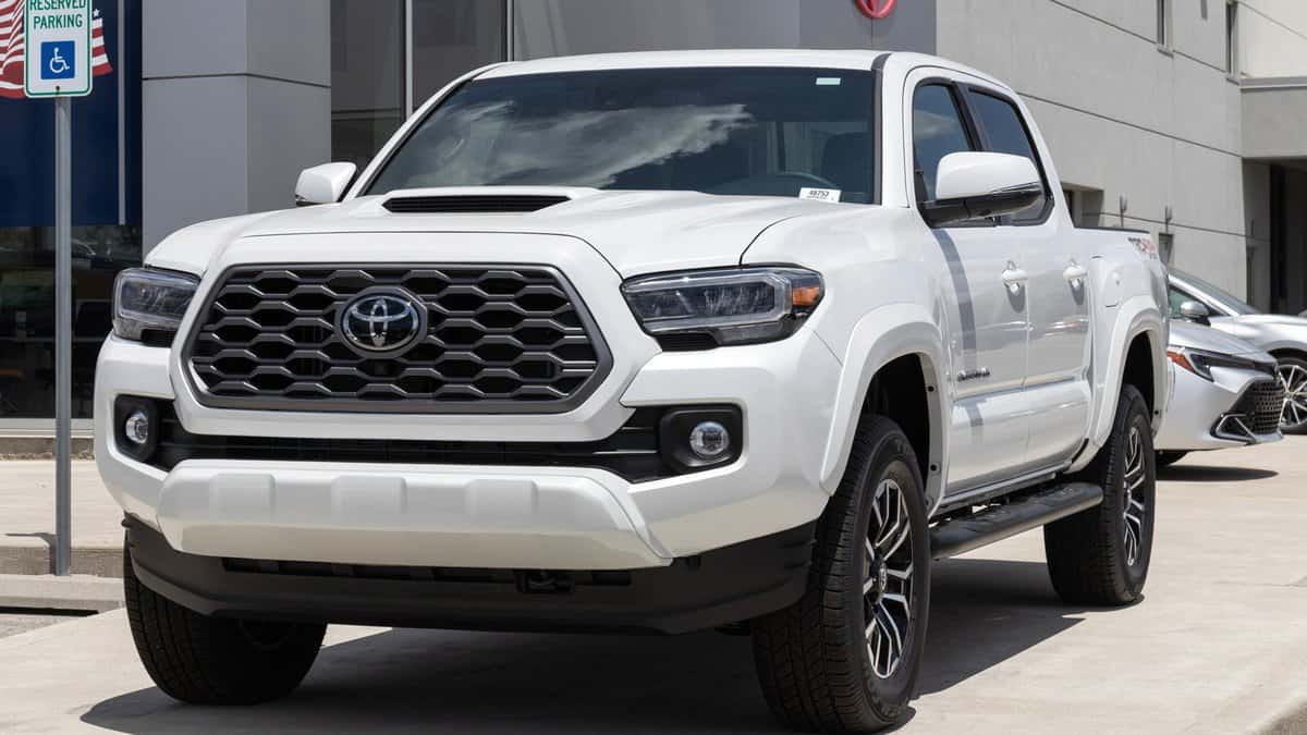  Toyota Tacoma display at a dealership. Toyota offers the Tacoma in SR, SR5, TRD, Limited, Trail SE, and TRD Pro models.